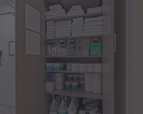 photo of a stocked closet with cleaning supplies